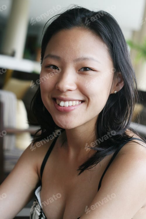 Preview: Portrait Of A Happy Young Woman From South Korea.