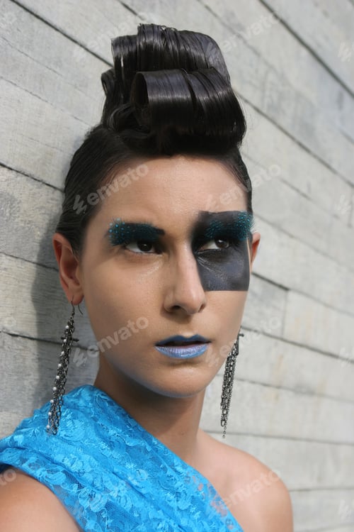 Preview: Fashion Image With Bold Make-Up And Modern Hairstyle.