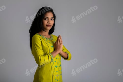Preview: Beautiful Indian Girl With Welcome Expression Or Inviting Or Greeting Namaste