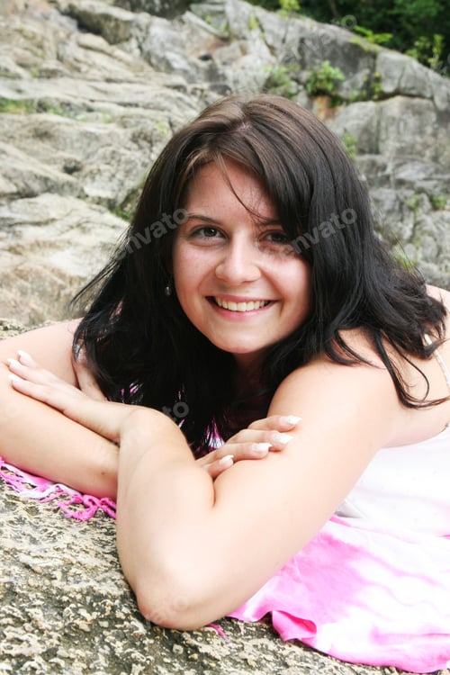 Preview: Portrait Of A Happy Brunette Woman.