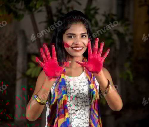 Preview: Young Girl Showing Colourful Palm And Celebrating Holi With Colour Splash