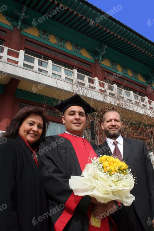 Preview: Happy Graduate With His Mother And Father.