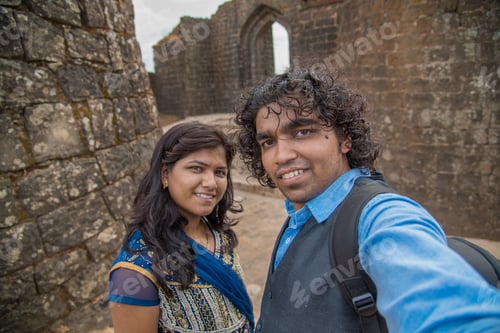 Preview: Indian Couple Taking A Selfie. Man Taking A Selfie With His Wife Or Girlfriend In Front Of Gawilgad