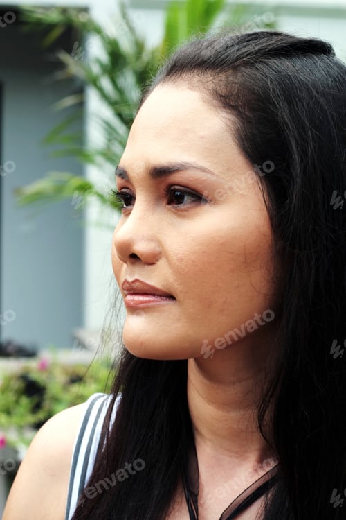 Preview: Close-Up Portrait Of A Happy Thai Woman.