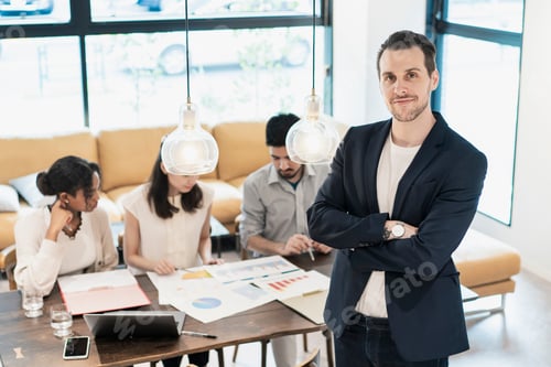 Preview: International Business Team With A Businessman Posing In The Office