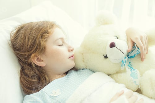 Preview: Girl Sleeping And Sick On The Bed With Teddy Doll In Her Hand At Hospital. Healthcare And Medical
