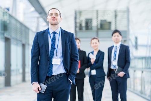 Preview: Businessman And His Business Team