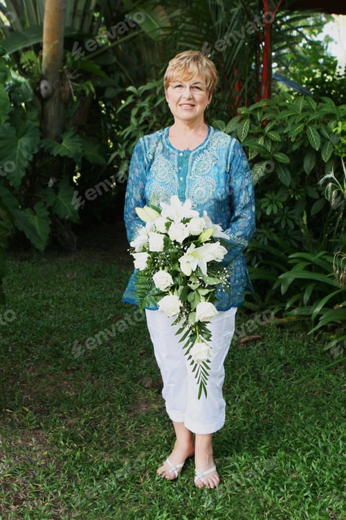 Preview: Mature Bride With A Bouquet Of Flowers.