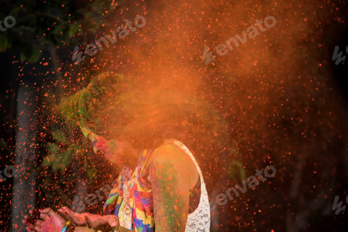 Preview: Young Girl Plays With Colors. Concept For Indian Festival Holi. Color Splash.