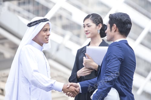 Preview: Working Woman And Arab People Work Together. Woman Work For Arab People With Business Project With