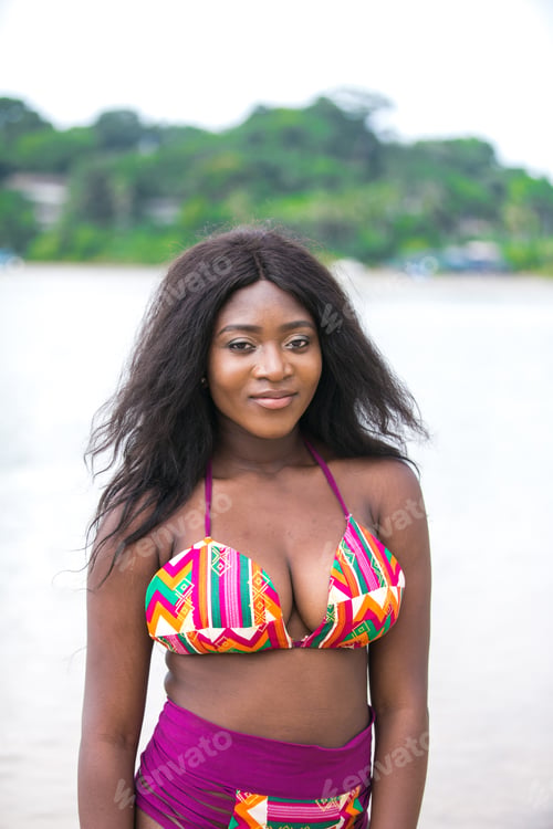 Preview: Beautiful African Woman At The Beach On Summer Holidays.