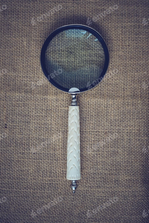 Preview: Magnifying Glass On Vintage Burlap Background With Instagram Style Filter