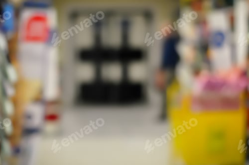 Preview: Blurred Interior Image. Inside Of Grocery Store With Brightly Color Merchandise.