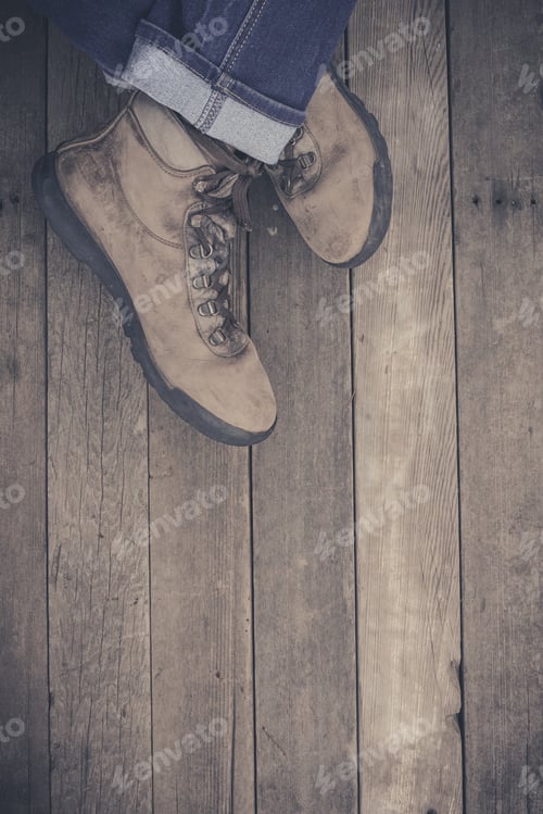 Preview: Feet. First-Person View On Rustic Wood Floor Background.