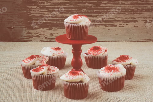Preview: Cupcake On Stand With Rustic Wood And Burlap Background