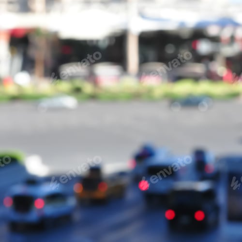 Preview: Cars And Walking People On The Street In The City At With Blurred Background