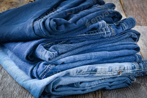 Preview: Denim Jeans On Wooden Background