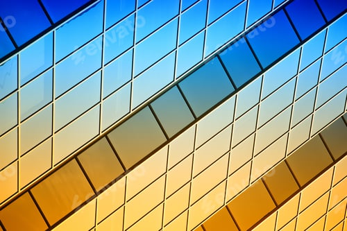 Modern Building Windows with Blue and Gold Reflection
