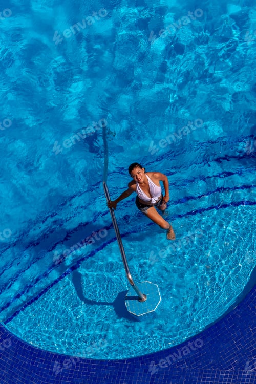 Preview: A Gorgeous Hispanic Brunette Model Enjoys A Day At The Pool At A Resort