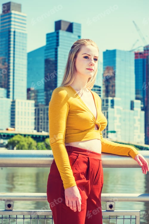 Preview: American Teenage Girl Traveling In New York In Spring, Wearing Yellow Long Sleeve Deep V Neck Fit