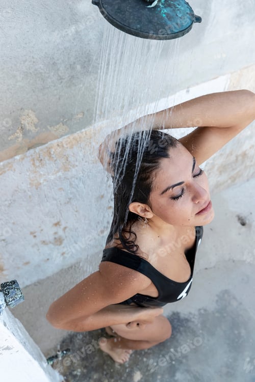 Preview: A Beautiful Hispanic Brunette Model Enjoying A Day Outdoors In An Open Shower