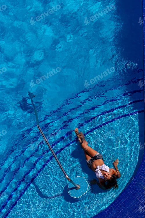 Preview: A Gorgeous Hispanic Brunette Model Enjoys A Day At The Pool At A Resort