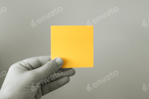 Preview: Hand Holding Blank Piece Of Paper