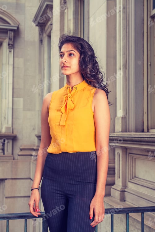 Preview: East Indian American College Student With Long Curly Hair Studying In New York, Wearing Sleeveless