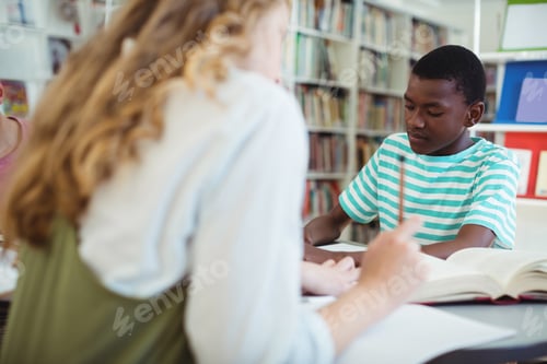 Preview: Attentive Classmates Studying In Library At School