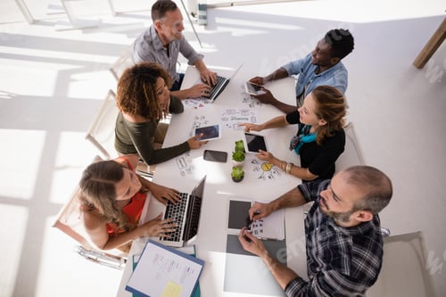 Preview: Executives Interacting With Each Other During Meeting In Office
