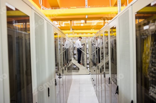 Preview: Technician Using Digital Cable Analyzer In Server Room