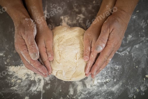 Preview: Close- Up Of Grandmother And Granddaughter Holding Dough In Their Hand