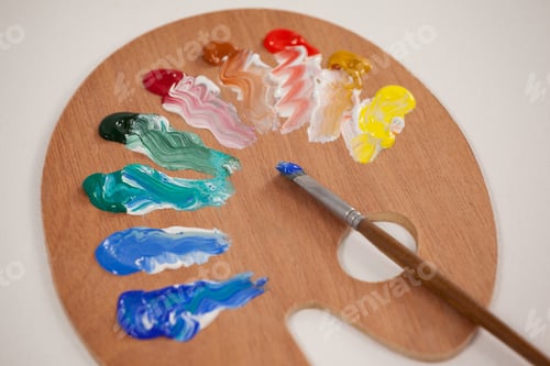 Preview: Colorful Paint Swirls on a Wooden Palette