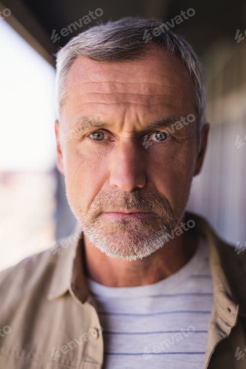 Preview: Close Up Portrait Of Mature Businessman In Office