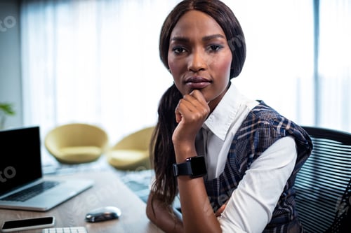 Preview: Serious Businesswoman Looking At The Camera In The Office