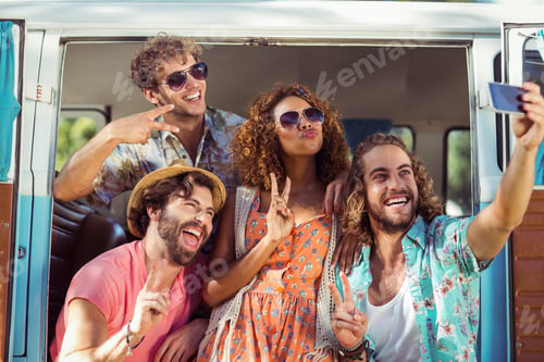 Preview: Group Of Happy Friend Taking A Selfie In Campervan At Park