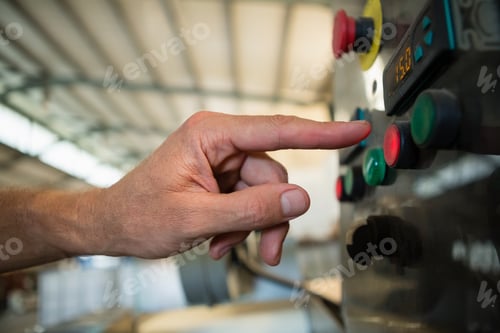 Preview: Hand Pressing A Control Button In Factory