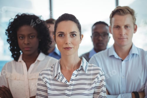 Preview: Portrait Of Business Colleagues Standing Together At Office