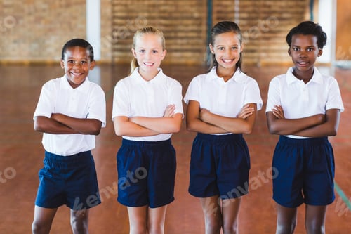Preview: Portrait Of School Kids Standing With Arms Crossed In Basketball Court At School Gym