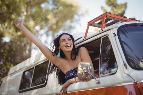Preview: Haooy Woman Leaning On Window Of Motor Home At Forest