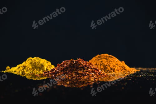 Preview: Close-Up Of Powdered Spices Against Black Background