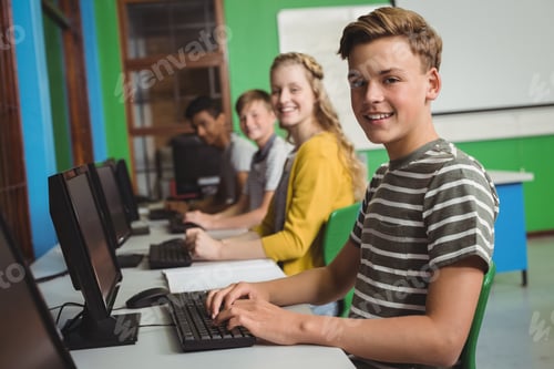 Preview: Smiling Students Studying In Computer Classroom At School
