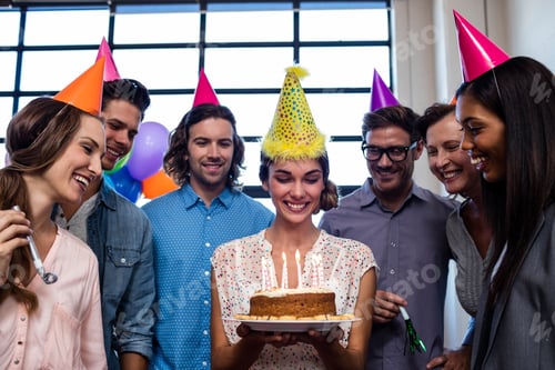 Preview: Happy Coworkers Celebrating A Birthday In The Office