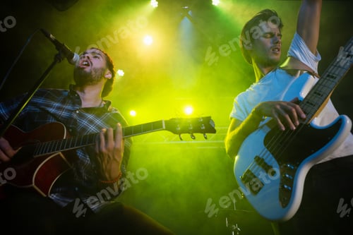 Preview: Band Performing On Stage In Nightclub