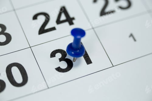 Preview: Close-Up Of Blue Pin Push On Day 31St Of Month End On White Calendar