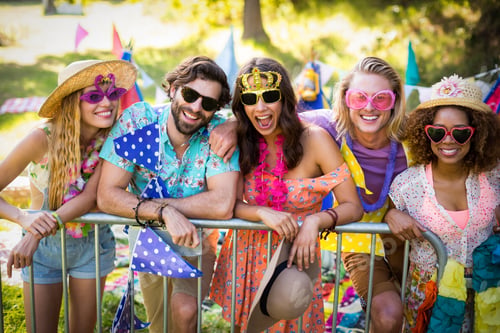 Preview: Portrait Of Friends Standing Together In Park On A Sunny Day