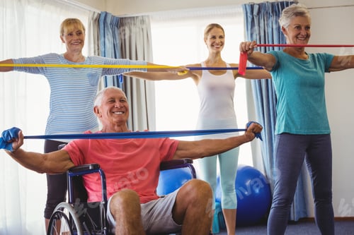 Preview: Seniors Stretching During Fitness Class In Retirement House