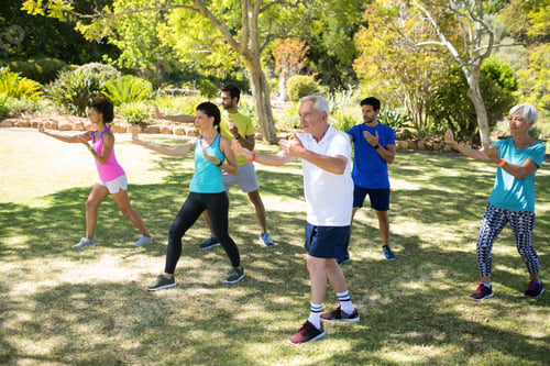 Preview: Group Of People Exercising In The Park On A Sunny Day