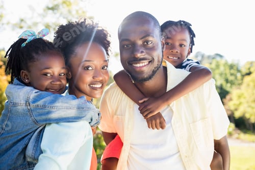 Preview: Close Up Of Happy Family Posing Together At Park