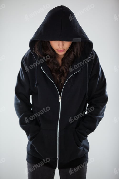 Preview: Spy In A Hoodie Standing Against White Background